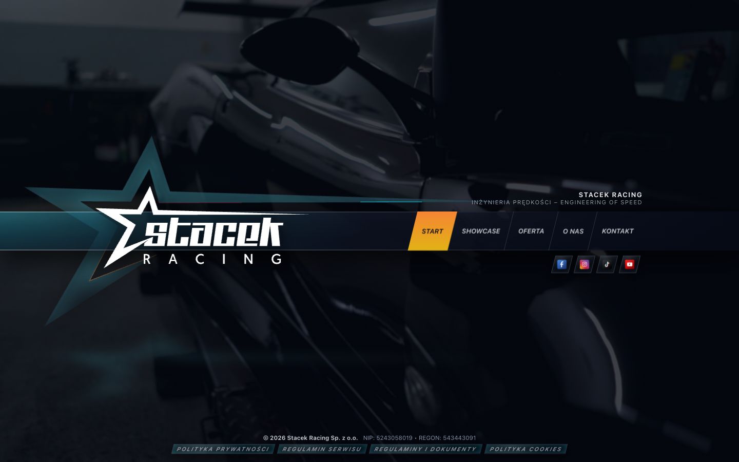 Pierwszy ekran serwisu Stacek Racing z filmowym tłem warsztatu i główną nawigacją